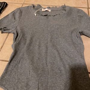 Bodysuit with ruffle feature